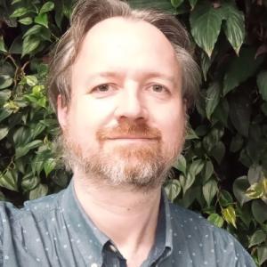 Tim is wearing a mask 🌈