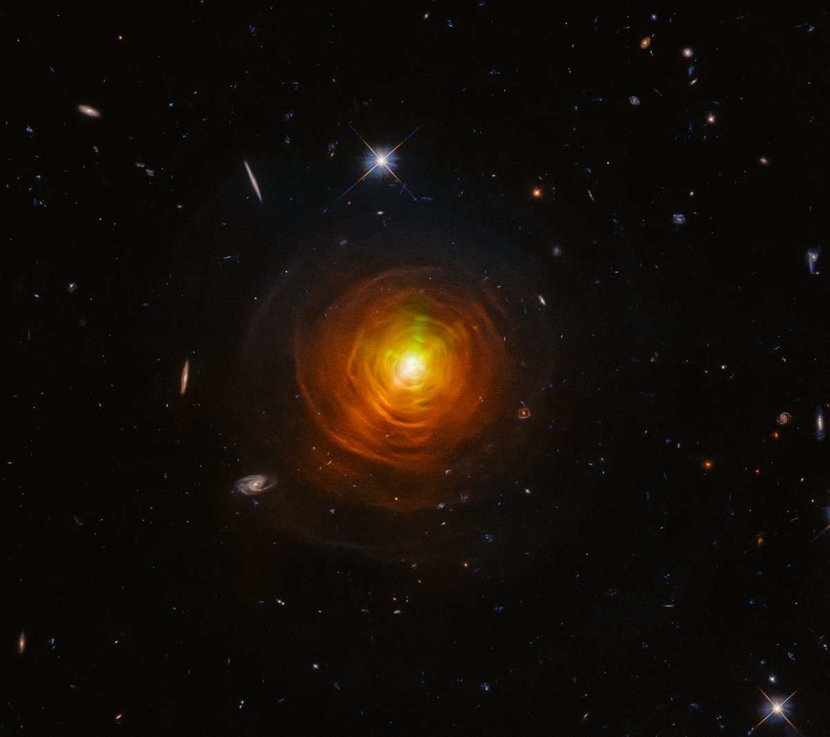 Glowing star resembling cobweb in deep space
