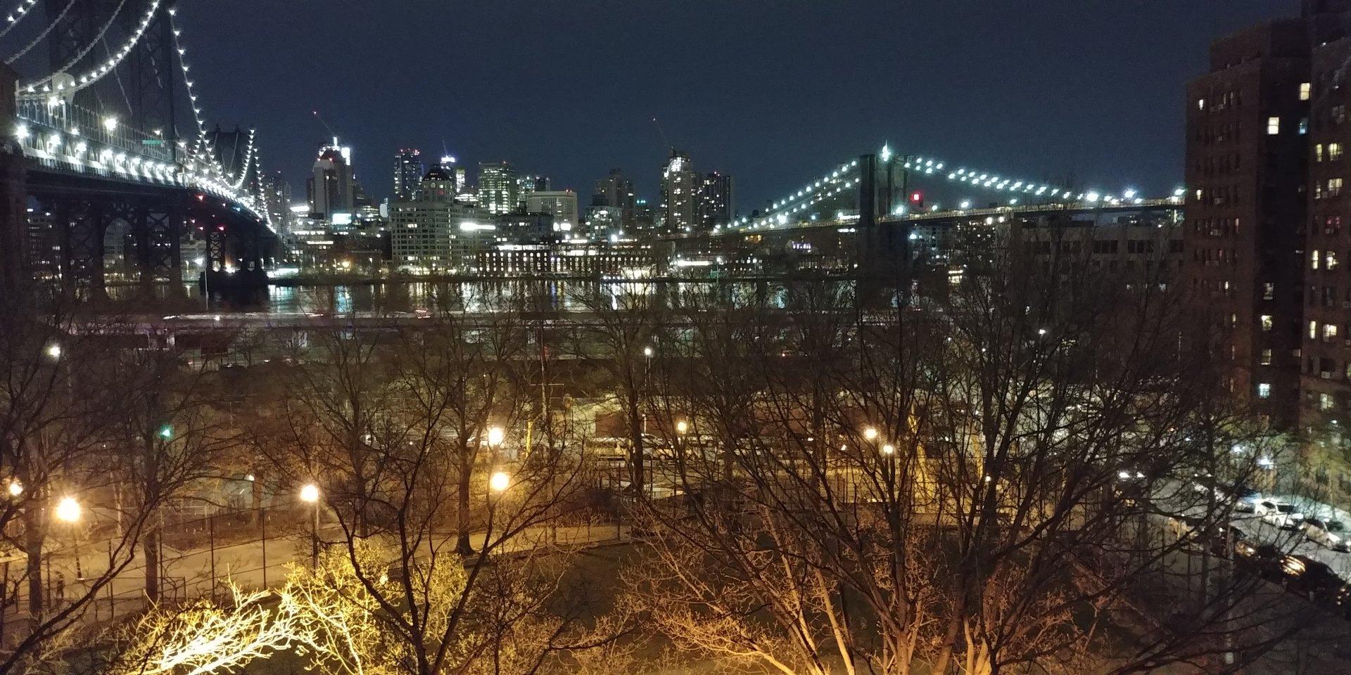 View from Chinatown NYC rooftop, of both Brooklyn & Manhattan bridge