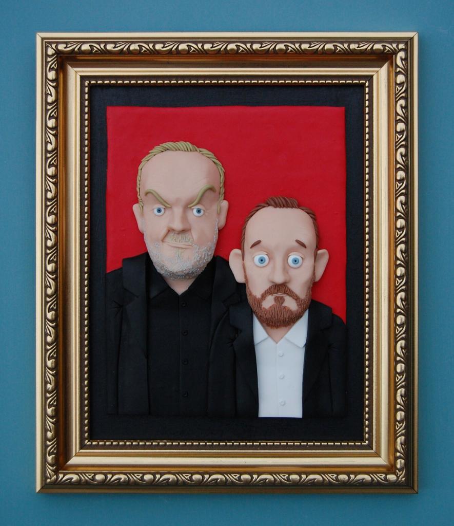 My clay painting of Greg Davies and Alex Horne as the Taskmaster and his assistant in a gold shabby frame