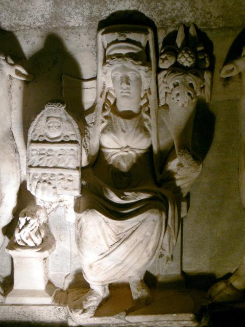 "Frieze showing a sacrifice to goddess Aphrodite in the theatre of Perge" Antalya Archaeological Museum. Perge collections.

In her right hand the Goddess, as the City of Perge, is holding her image.