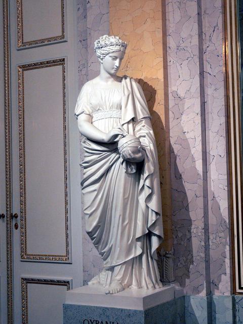 Statue of the Muse Urania by Joseph Klieber (1825) in the Hall of Muses at the Palais Erzherzog Albrecht, Vienna.

Wolfgang Sauber, CC BY-SA 3.0, via Wikimedia Commons.