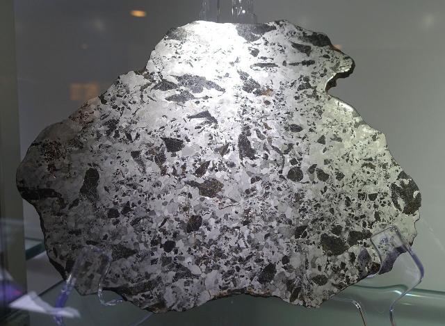 Northwest Africa (NWA) 5549 Iron Meteorite at Arizona State University.

Daderot, CC0, via Wikimedia Commons.