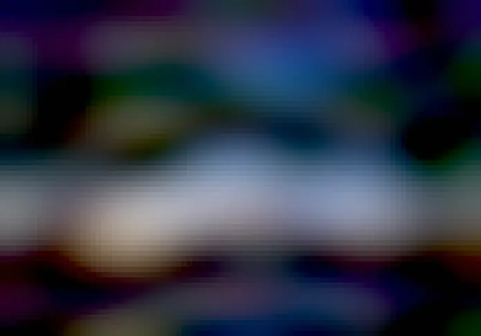 Mt Fuji at sunrise seen under an arc of maple trees