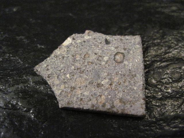 Slice of the Northwest Africa (NWA) 6212 Meteorite.

Jon Taylor, CC BY-SA 2.0, via Flickr