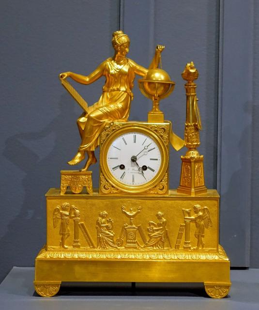 Mantel clock representing Urania or Astronomy by B. J. Vanderveken (early 1800s) at the Montreal Museum of Fine Arts.

Daderot, Public domain, via Wikimedia Commons.