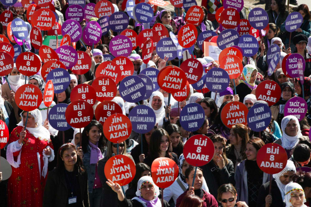 Kurdish women demonstrate during International Women's Day celebrations in Diyarbakir, Turkey, on March 10, 2007. Their protest signs read: "Woman, life, freedom," "Long live March 8," "No to the massacres of women" and "No to harassment and rape."