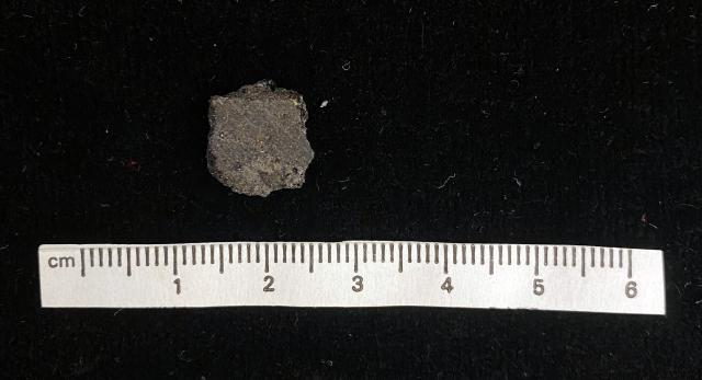 A piece of the Angra dos Reis Meteorite that fell on January 20, 1869 in Brazil. It is the type specimen of the Angrites and one of the rarest meteorites.

Courtesy of the Peabody Museum of Natural History; Open Access, publicdomain/zero/1.0; Mineralogy and Meteoritics, Yale University; https://collections.peabody.yale.edu/search/Record/YPM-MIN-100948

Color edits.