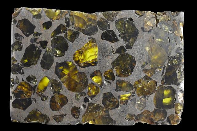 The Esquel Pallasite was found in 1951 near a town in the province of Chubut, Argentina. Etched slices of the Esquel Pallasite make some of the most beautiful pieces of art.

Photographer: Rodney Start, Copyright Museums Victoria / CC BY (Licensed as Attribution 4.0 International)

https://collections.museumsvictoria.com.au/specimens/100