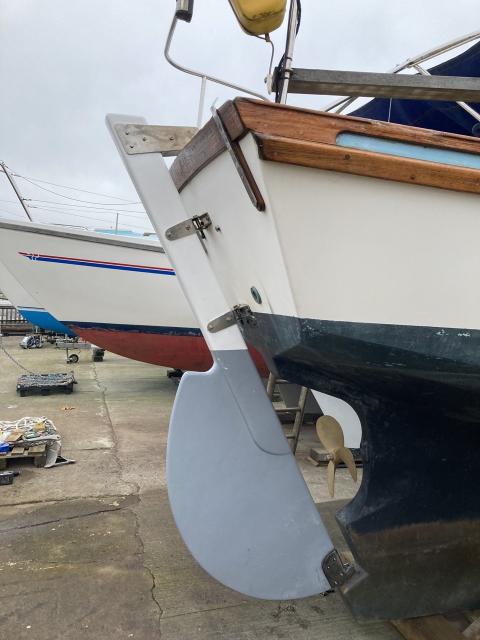 Hale Kai’s transom, with the restored rudder attached once more