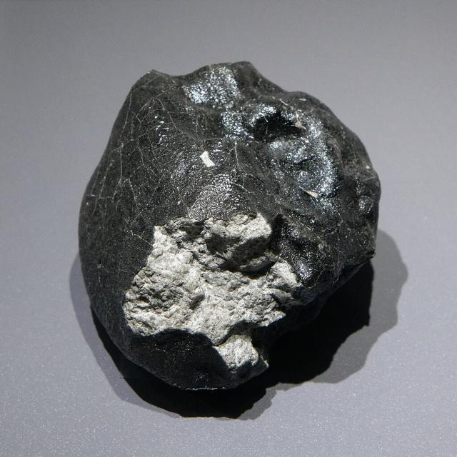 A fragment of the Alby sur Chéran Meteorite that fell in France sometime in February 2002; photo taken at the National Museum of Natural History in Paris.

Marie-Lan Taÿ Pamart, CC BY 4.0, via Wikimedia Commons.