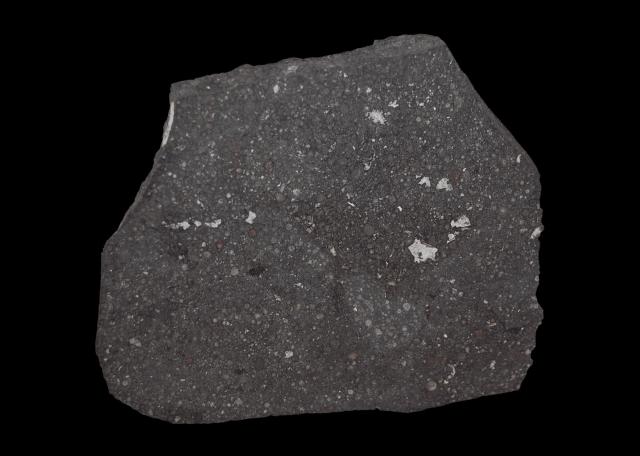 A slice of the Vigarano Meteorite that fell in Italy on January 22, 1910. 

the paleobear, CC BY 2.0, via Wikimedia Commons.