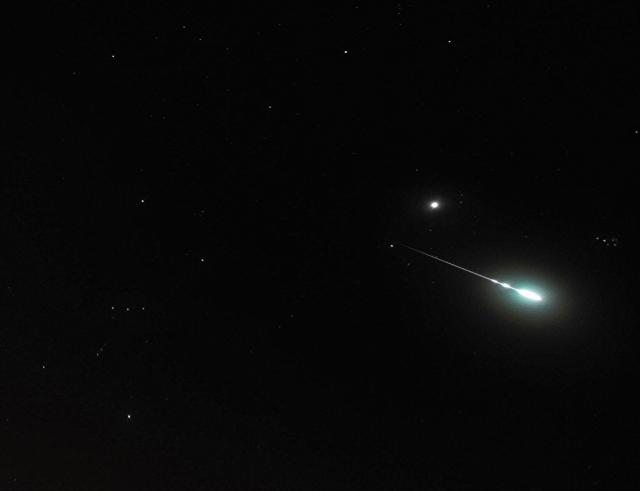 Geminid Meteor between Orion and the Pleiades on December 15, 2012.

John Flannery from Richmond County, North Carolina, USA, CC BY-SA 2.0, via Wikimedia Commons or Flickr: https://flic.kr/p/dBbFM1