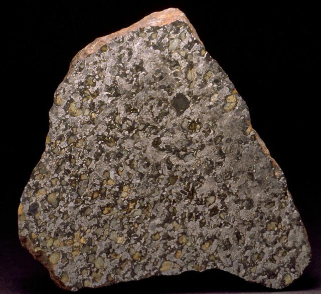 The first mass of the Bencubbin Meteorite was found in 1930 in Australia.

SI National Museum of Natural History, CC0 via https://www.si.edu/object/bencubbin:nmnhmineralsciences_1020332

Cropping and color edits.