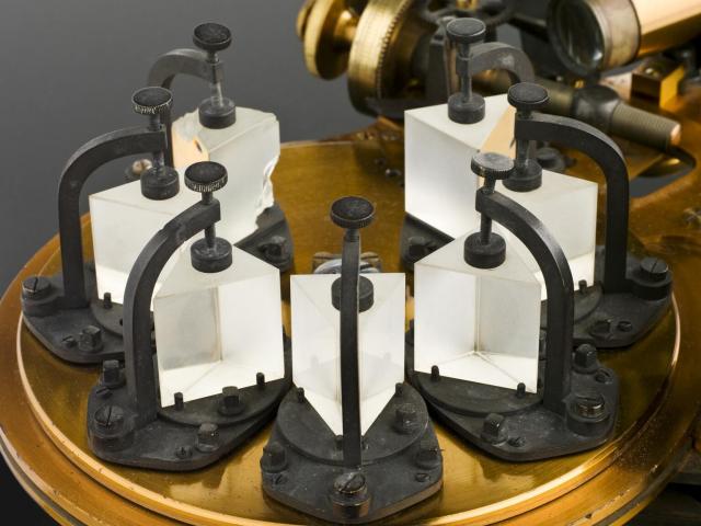 "Astronomical spectroscope from Norman Lockyer Observatory, brass, with train of seven prisms. Thought to be the one made by John Browning, London for Norman Lockyer who first used it to view Solar Prominences [chromosphere] outside a solar eclipse."

Science Museum Group, CC BY-NC-SA 4.0 via Norman Lockyer’s seven-prism spectroscope. 1987-1162/1 Science Museum Group Collection Online. https://collection.sciencemuseumgroup.org.uk/objects/co8645495/norman-lockyers-seven-prism-spectroscope-spectroscope-astronomica-solar-eclipse