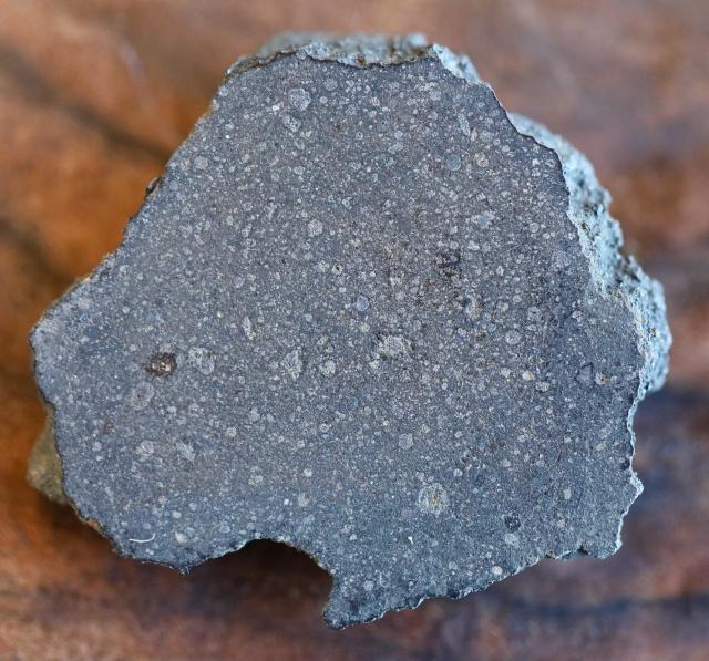 Endcut of the Chwichiya 002 Meteorite that was found in Western Sahara on June 10, 2018.

Steve Jurvetson, CC BY 2.0 via Flickr: https://flic.kr/p/2nDWEaM