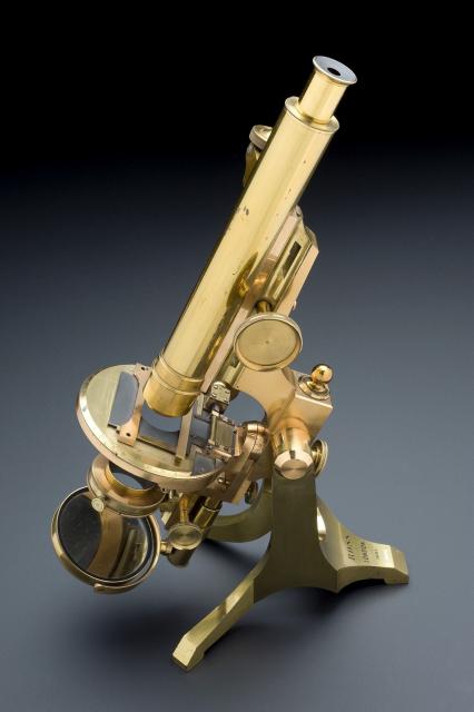 Compound monocular microscope, with the Schroeder fine adjustment (1890-1900).

Wellcome Images, CC BY 4.0, via Wikimedia Commons.