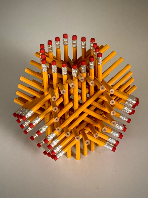 72 pencils arranged into four intersecting hexagonal prisms