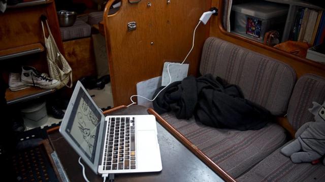 a macbook air 2013 charging via a 12v DC car charger on a sailboat.
