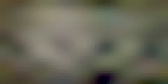 A map of the USA is shown with the path of the greatest darkness of two solar eclipses shown in dark colors.