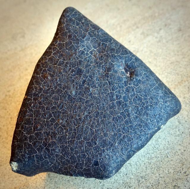 A fragment of the Hammadah al Hamra 346 (Ghadamis) Meteorite that was found in 2019 in Libya.

Steve Jurvetson, CC BY 2.0 via Flickr: https://flic.kr/p/2nE1d4b

Color edits.