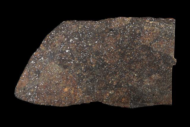 Plainview (1917) Meteorite was found in Texas, USA in 1917.

Photographer: Rodney Start, Copyright Museums Victoria / CC BY (Licensed as Attribution 4.0 International)

https://collections.museumsvictoria.com.au/specimens/198

Color edits.