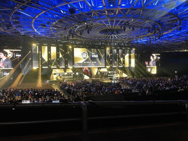 The arena is lit up and filled now