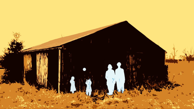 Silhouettes of children playing, on a barn.