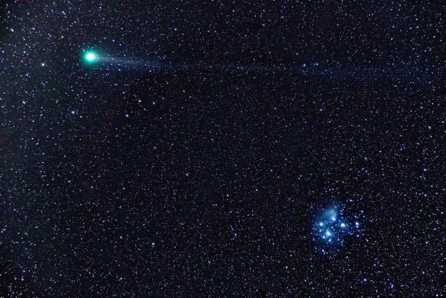 "Comet Lovejoy meets the Pleiades."

Noriaki Tanaka, CC BY 2.0 via Flickr: https://flic.kr/p/qV3LeT