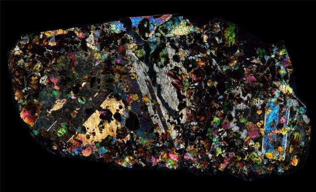 "Northwest Africa (NWA) 1950 Meteorite Thin Section."

Solar Anamnesis, CC BY-NC-ND 2.0 via Flickr: https://flic.kr/p/21HD1nK