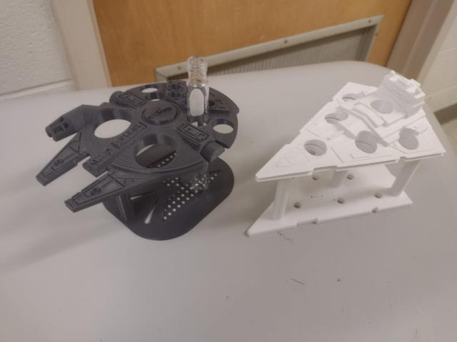 Test tube holders shaped like the Millennium Falcon and a star destroyer