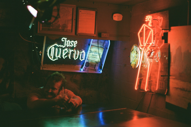 My brother in a dimly lit bar.