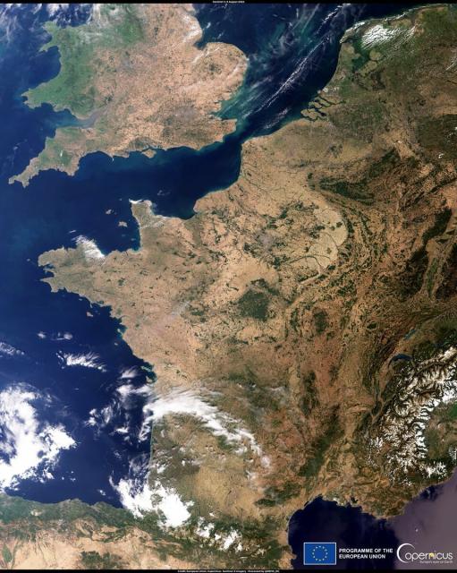 Recent satellite picture of mostly france and the south of england. The land parts are essentially light brown.
