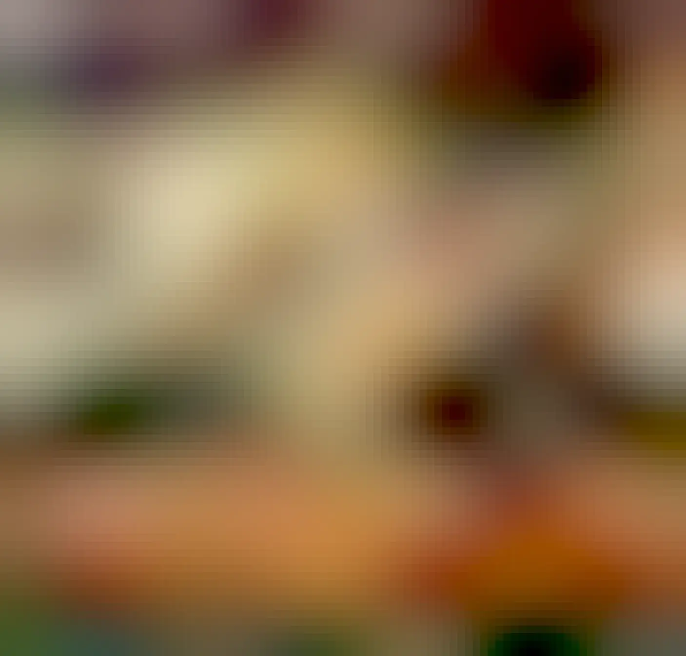 Ginger cat lying on a table