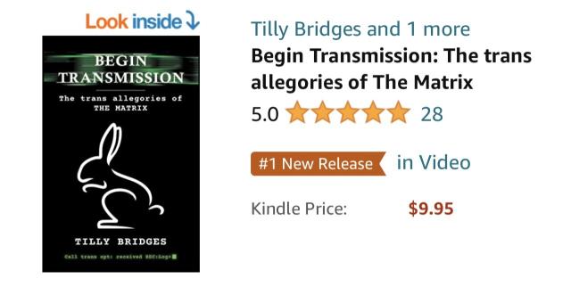 a screenshot showing BEGIN TRANSMISSION: THE TRANS ALLEGORIES OF THE MATRIX has 28 5-Star reviews on Amazon, and is still the #1 new release in Video (books about movies/tv)