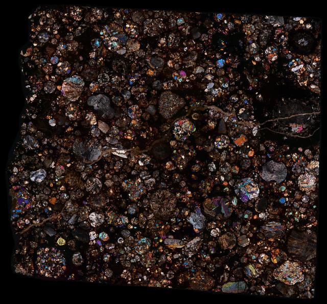 "Northwest Africa (NWA) 8773 Meteorite Thin Section."

Solar Anamnesis, CC BY-NC-ND 2.0 via Flickr: https://flic.kr/p/2kCB5no