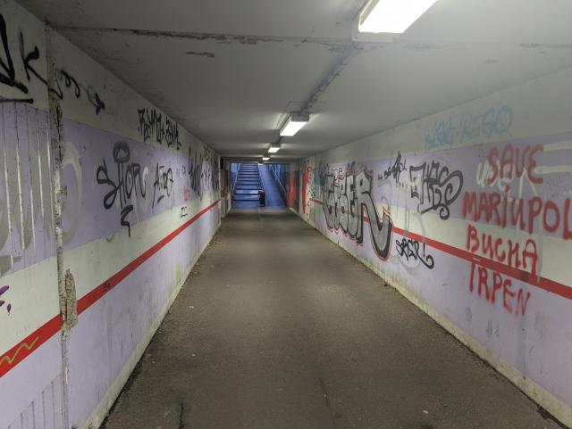 Tunnel under S-Bahn station with graffiti on the walls