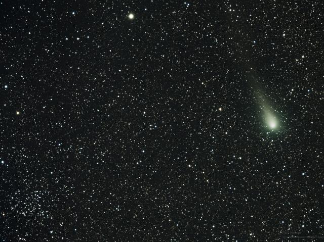 "Comet C2013 US10 (Catalina) passing open cluster NGC 5823 on September 7, 2015."

Paul Stewart, CC BY 2.0, via Wikimedia Commons or Flickr: https://flic.kr/p/yhme5b