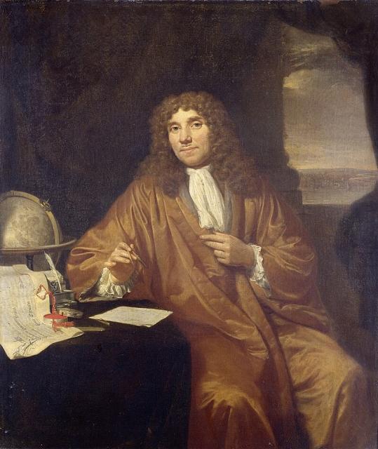 Portrait of Anthony van Leeuwenhoek (1632-1723), physicist in Delft. Knee piece, seated at a writing table on which lies a certificate of his appointment as a member of the Royal Society of Physicians in London by Charles II. Also, a globe and an inkstand; he holds a compass in his hand.