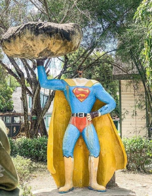 little dog head and superhero body