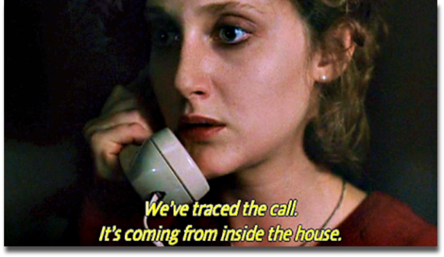 "When a Stranger Calls" (1979): A closeup of babysitter Jill Johnson (Carole Kane) on a telephone, as she learns from the local police that the person who's been harassing her is calling from inside the house.