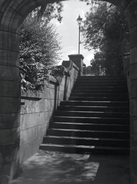 A 6x4.5 medium format black and white photograph of a set of hidden steps in Wigan