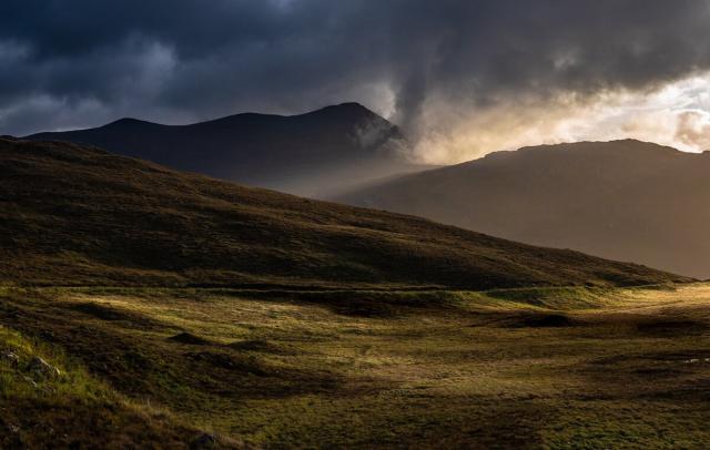 Dark sky, slithers of sunlight.