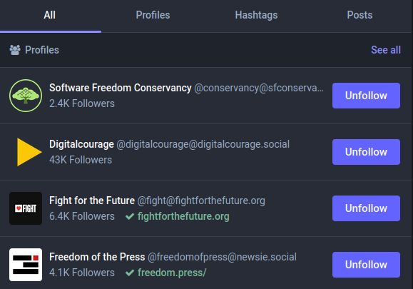 Screenshot of the account profile search, with four profiles highlighted, two of which have checkmarks next to a domain, indicating that they've completed the link verification process for those domains.
