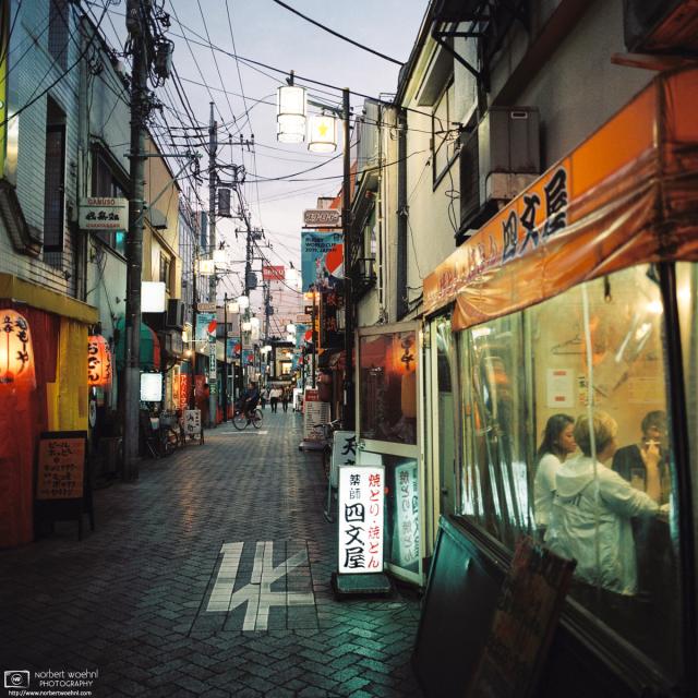Pubs opening at dusk along Star Road in Asagaya, located in the Suginami ward of Tokyo, Japan.