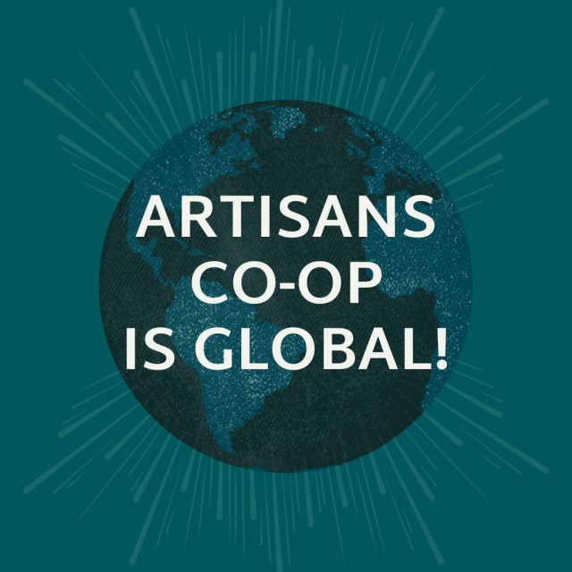 A dark green earth with the words "Artisans co-op is global!" across it. 