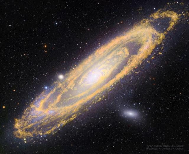 The featured image shows M31, the Andromeda Galaxy, in both infrared light, colored orange, and visible light, colored white and blue.