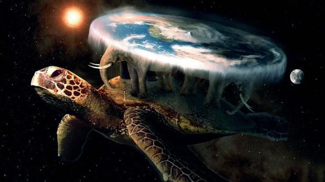 A turtle in space with elephants atop it. The elephants hold a flat world. Read more Terry Pratchett, this is from Discworld.