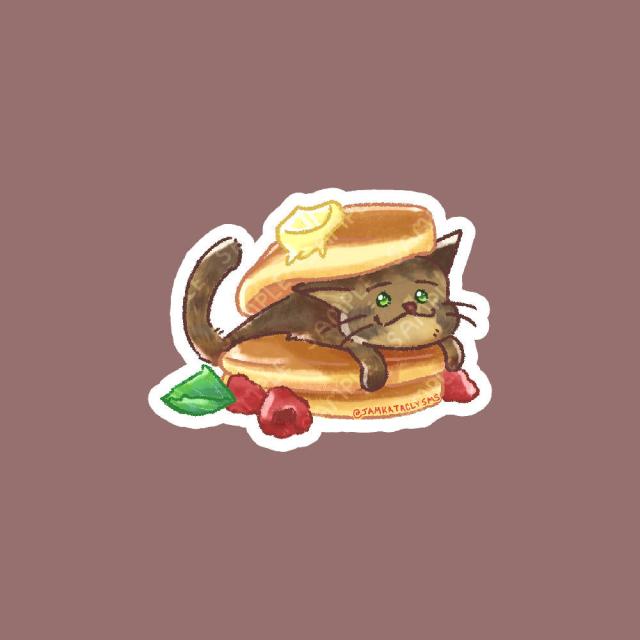 Illustration of a tabby cat laying between a stack of pancakes! The illustration is by JamKats (@jamkataclysms)