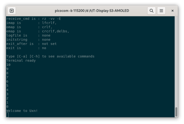 A screenshot of a terminal connected to an ESP32, with a countdown, then showing "Welcome to Uxn!"